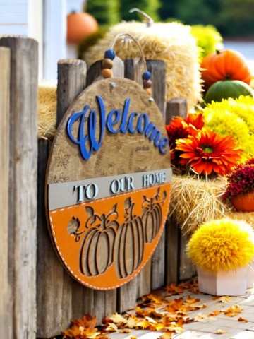 Welcome to Our Home Fall Sign – Pumpkin Door Hanger with Engraved Autumn Icons – Blue or Berry Color Options