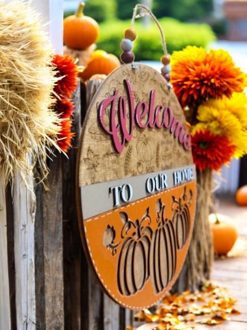 Welcome to Our Home Fall Sign – Pumpkin Door Hanger with Engraved Autumn Icons – Blue or Berry Color Options