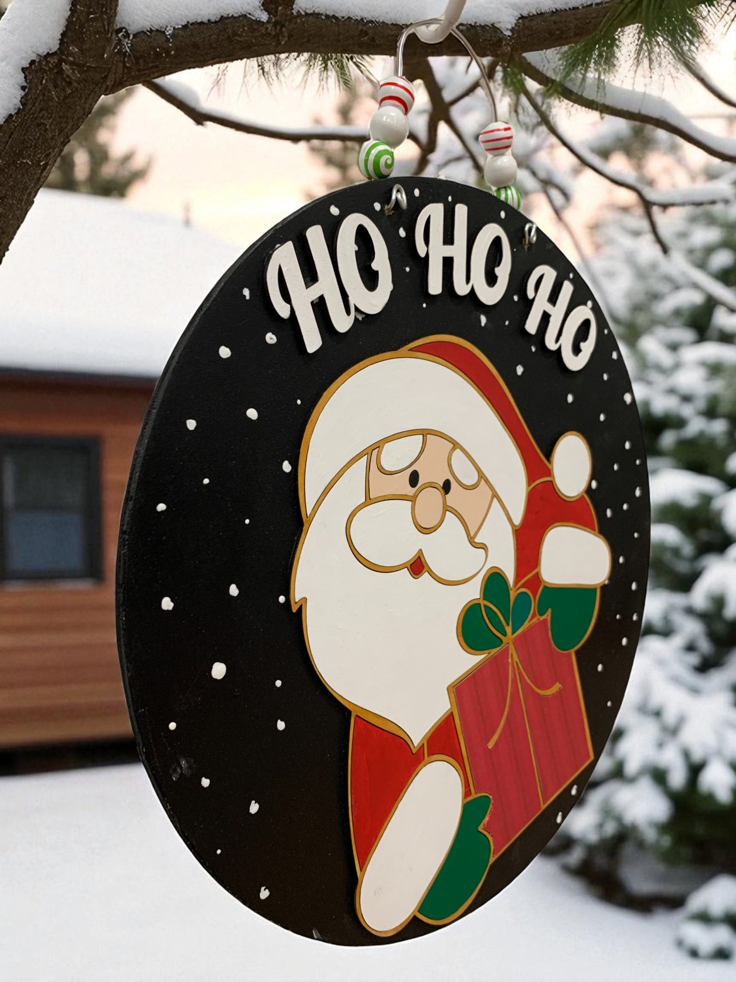 Santa “Ho Ho Ho” Christmas Door Sign – Handmade Round Holiday Sign with Gift Bag & Snowflakes