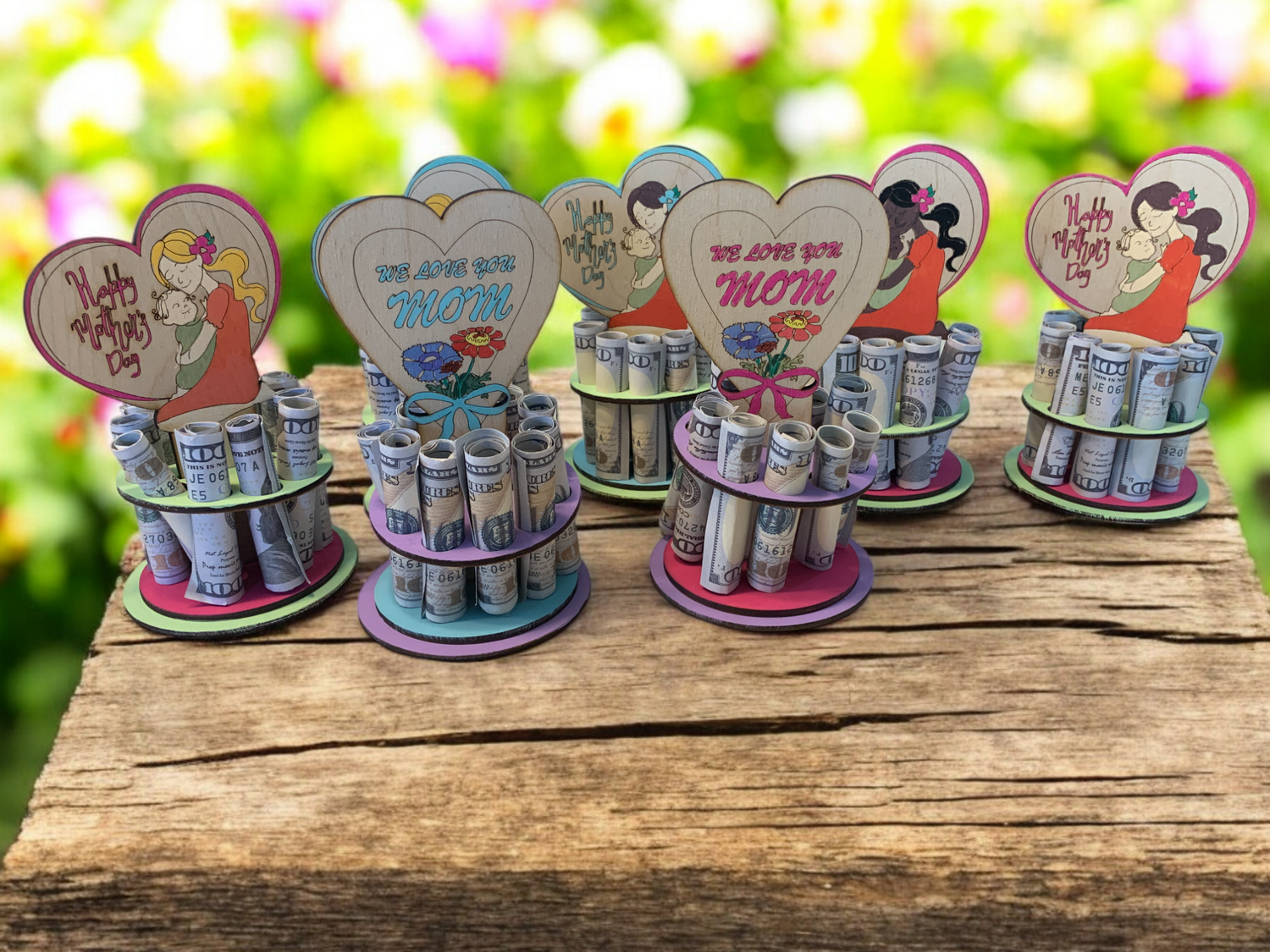 Mother's Day Money Trees — handmade wooden cash gifts with heart toppers and mom figures, displayed with rolled bills, perfect for Mother's Day gifting from kids, grandkids, and family