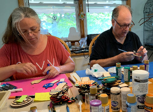 April and Rick working on A gifting trees money trees