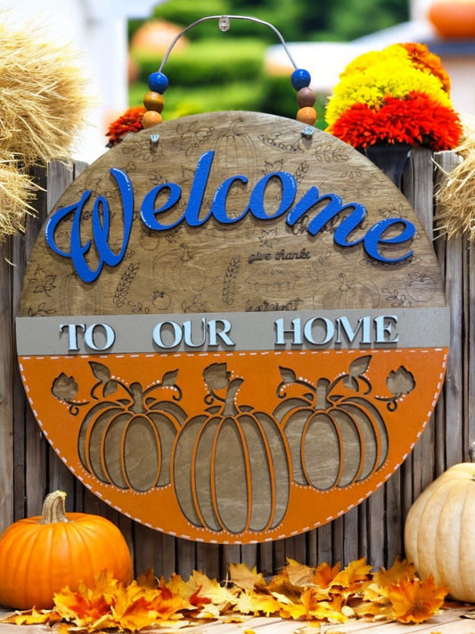 Welcome to Our Home Fall Sign – Pumpkin Door Hanger with Engraved Autumn Icons – Blue or Berry Color Options