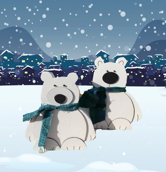 Illustration of two handcrafted polar bear shelf sitters with hand-painted details, wearing fabric scarves, on a snowy background.